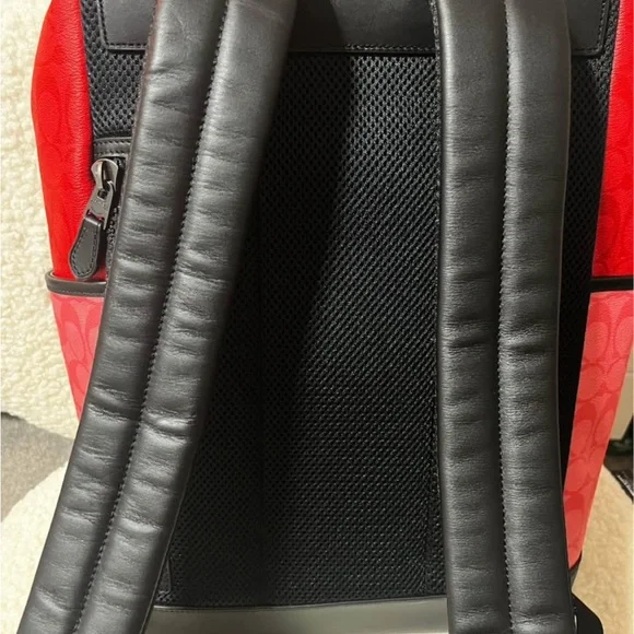 COACH multi colored men’s backpack
